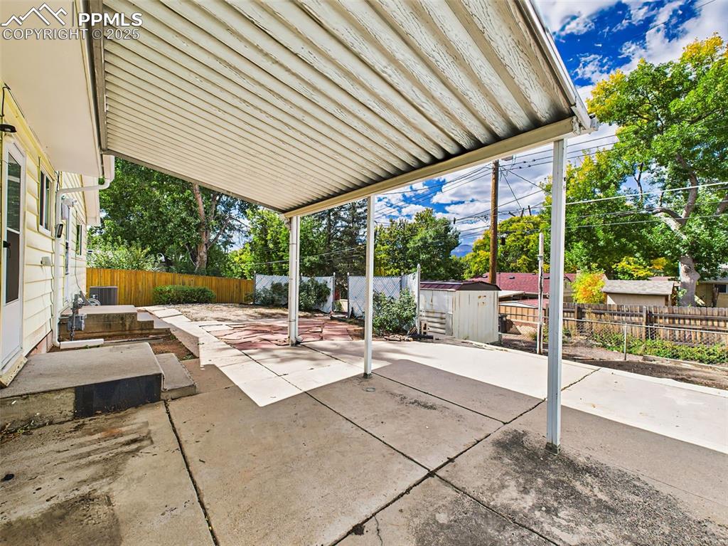 Image 37 of 40: The covered patio is perfect for outdoor entertaining and barbecues!