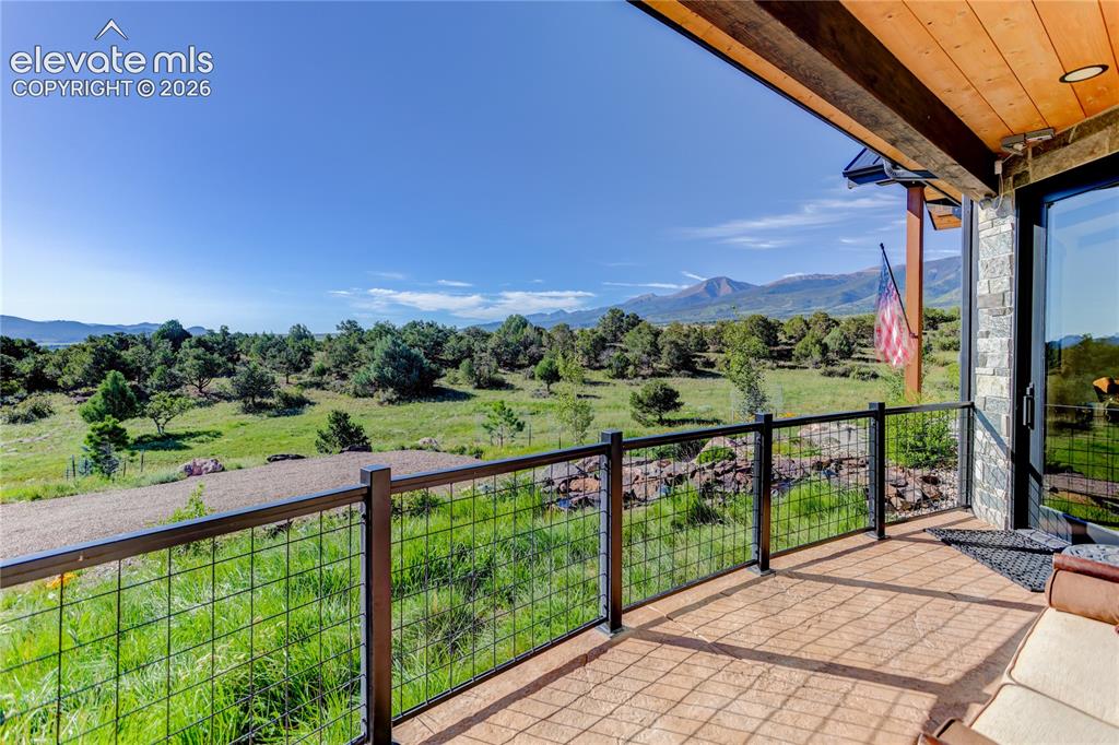 Image 15 of 50: Private patio off of primary suite
