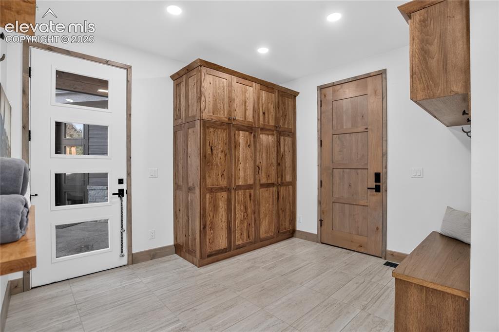 Image 18 of 50: Mudroom w/ built-in storage