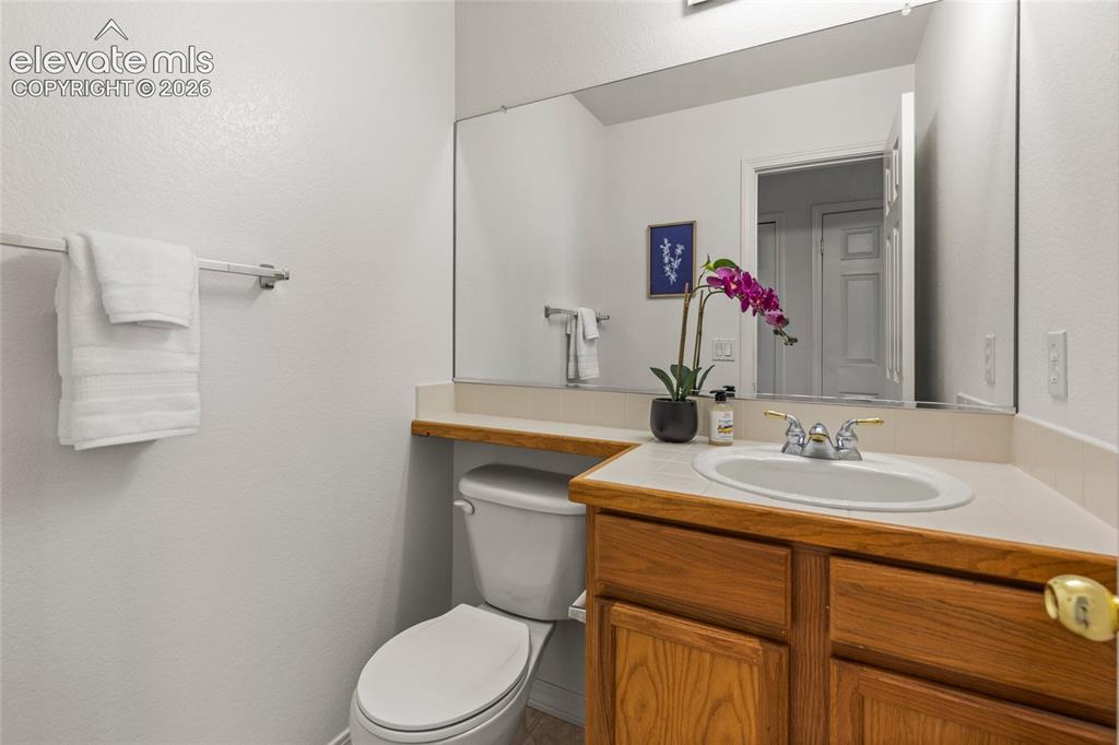 Image 14 of 33: Powder Bathroom for All Guests