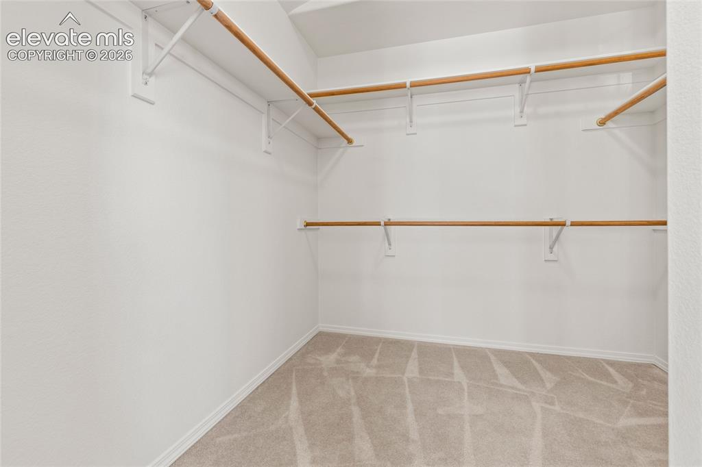 Image 19 of 33: Large Walk-In Closet