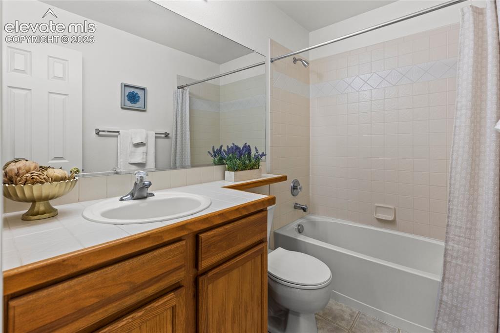 Image 20 of 33: Upstairs Bathroom Shared Between Second and Third Bedrooms