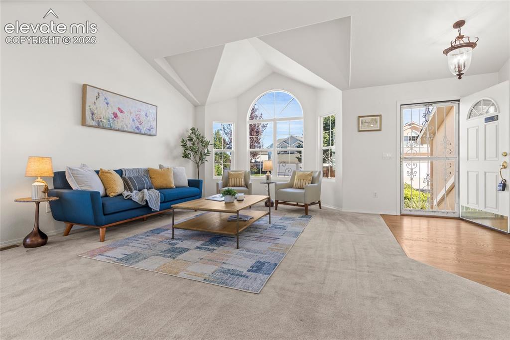 Image 3 of 33: Spacious, Inviting Entry Room with Vaulted Ceilings