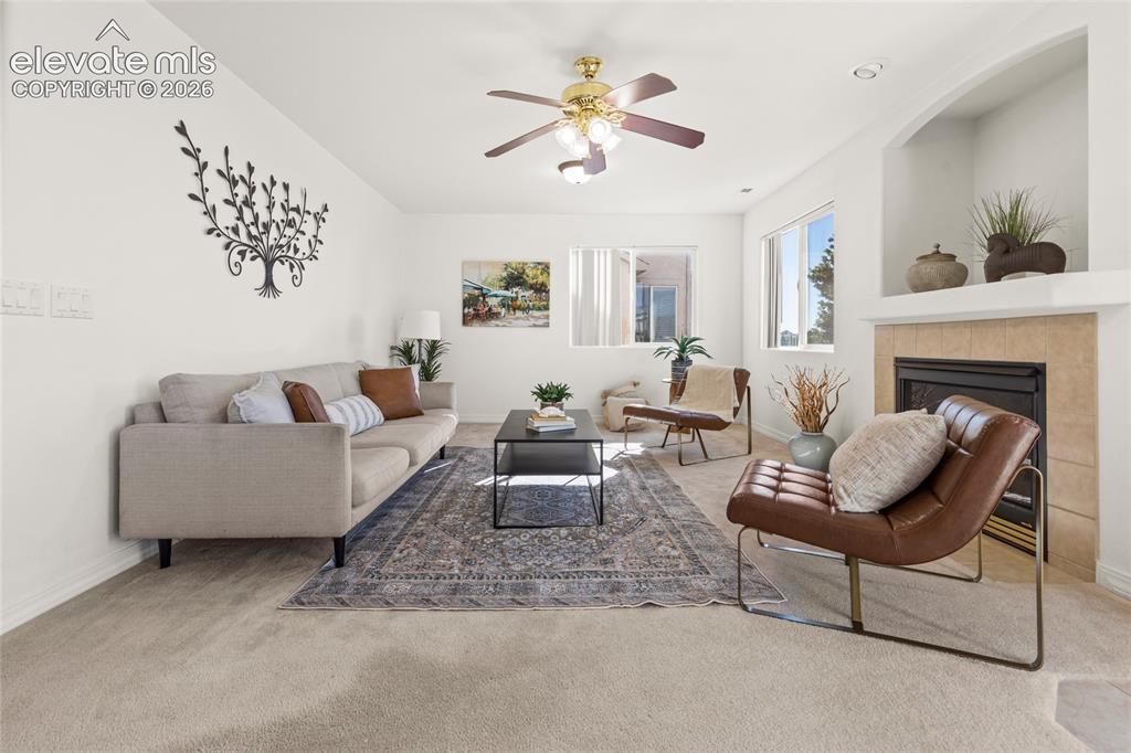Image 9 of 33: Cozy Lower Living Area with Great Light