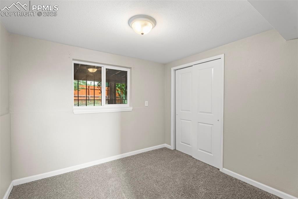 Image 13 of 23: Bedroom