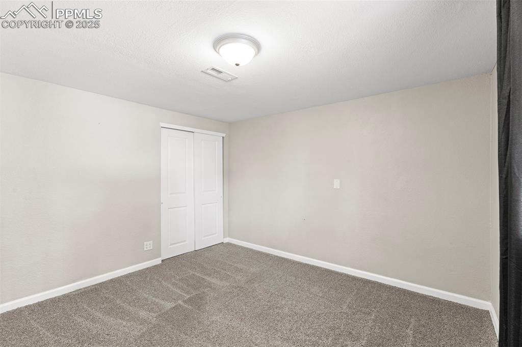 Image 15 of 23: Bedroom