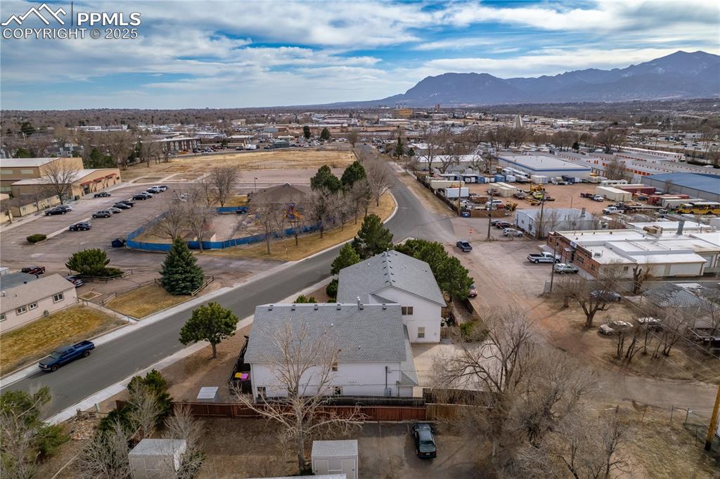Image 29 of 40: Birds eye view of property featuring a mountain view