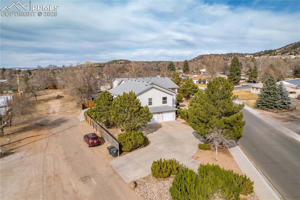 Image 35 of 40: Birds eye view of property featuring a mountain view