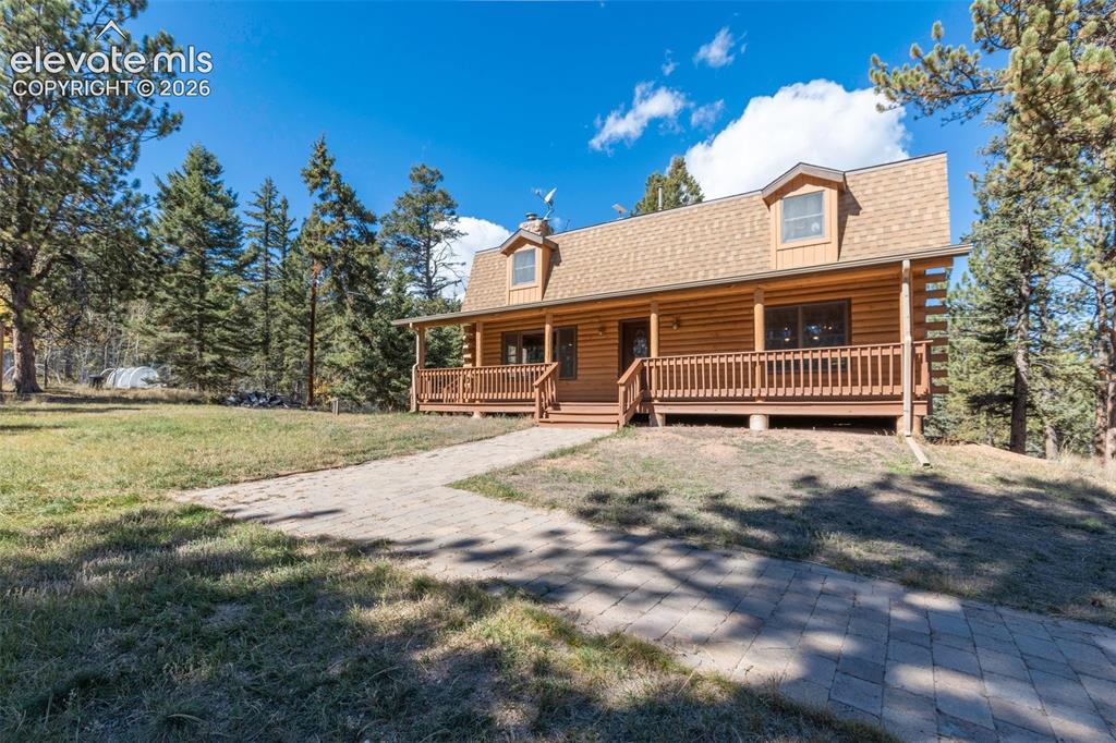 Image 1 of 50: Full log home