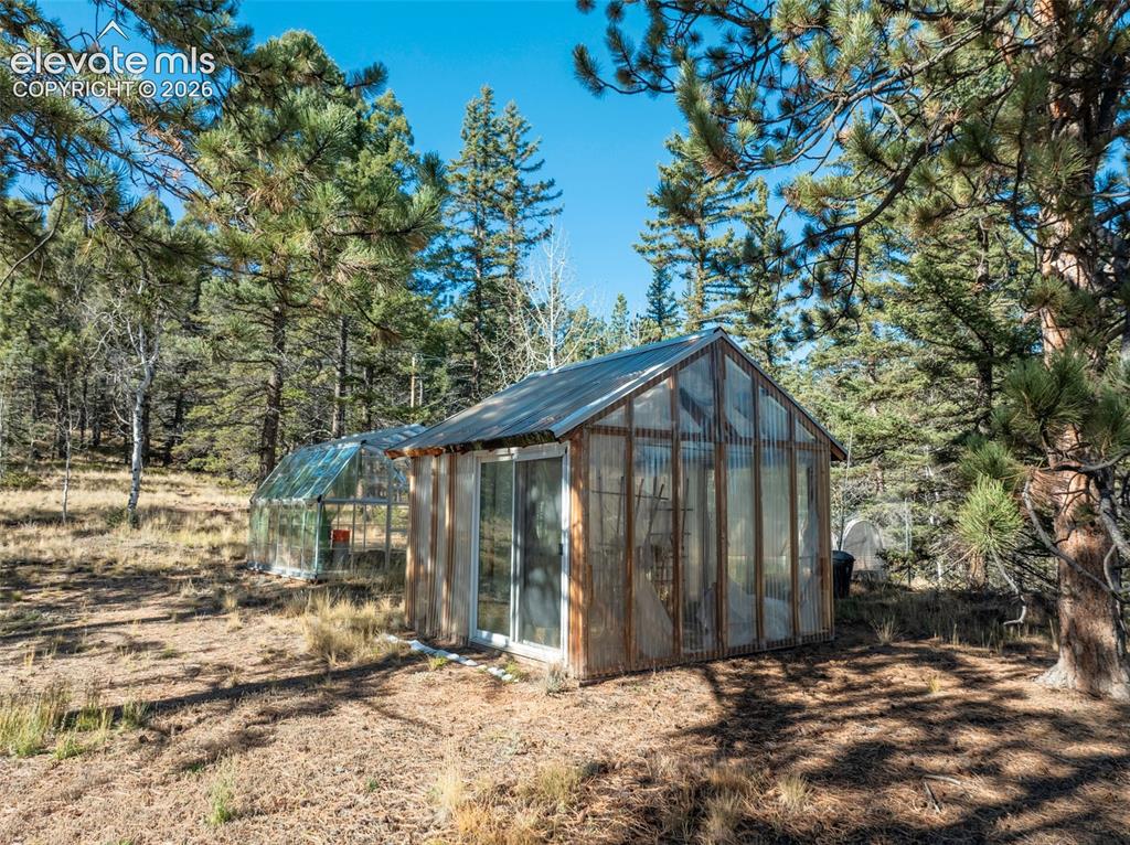 Image 11 of 50: 2 Greenhouses