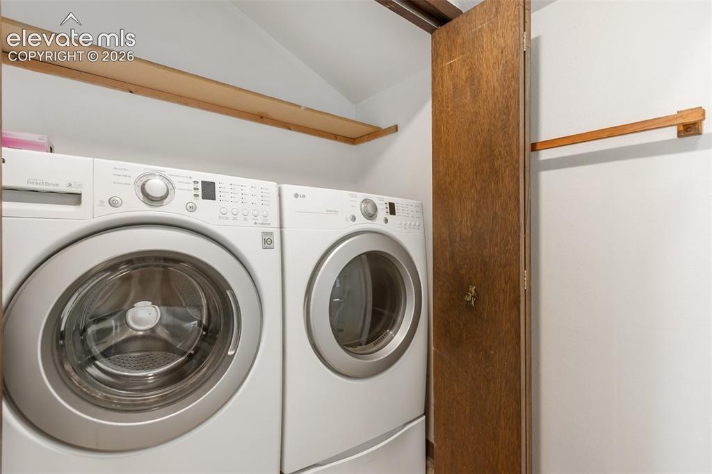 Image 26 of 50: Washer Dryer in Master Bathroom