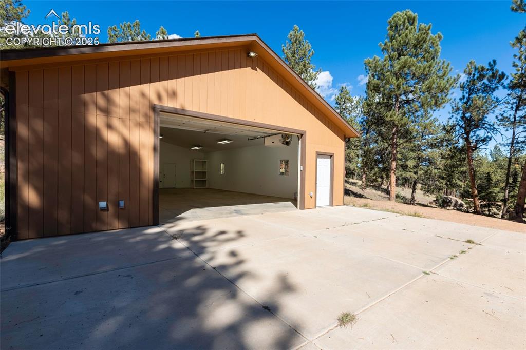 Image 5 of 50: Tons of parking. 50 amp RV pedestal. Insulated, heated. 200 amp feed throug