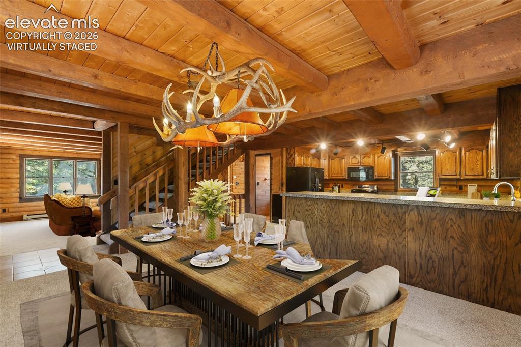 Image 7 of 50: Oversized dining area. Virtually staged.