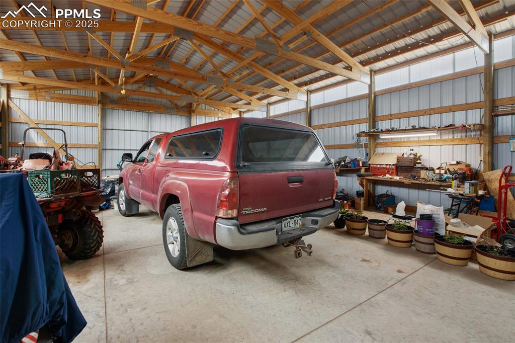 Image 41 of 49: Garage featuring metal wall