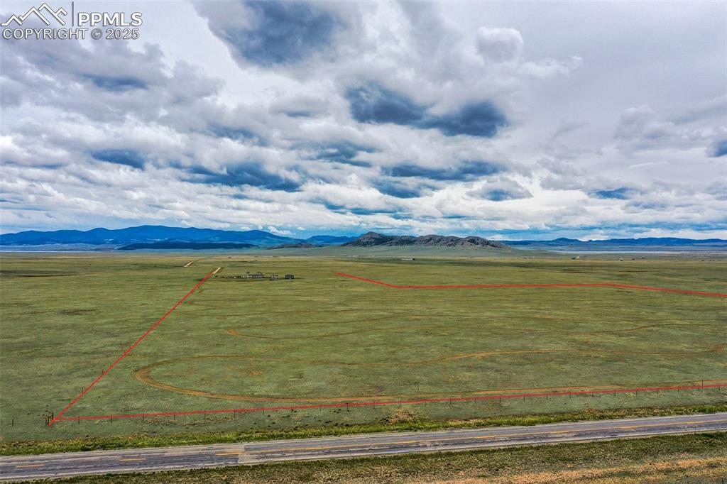 Image 47 of 49: mountains and property parcel outlined. Mountain Views to the south. See ad