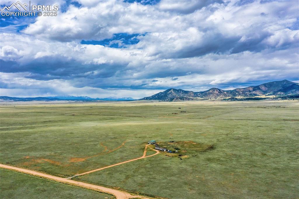 Image 48 of 49: 53 Acre Oasis! Mountain Views to the south. See additional red line lot lin