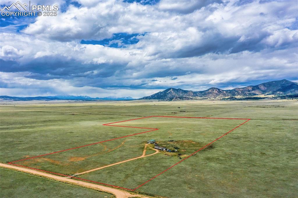 Image 49 of 49: Mountain Views to the south. See additional red line lot line overlays. "Pr