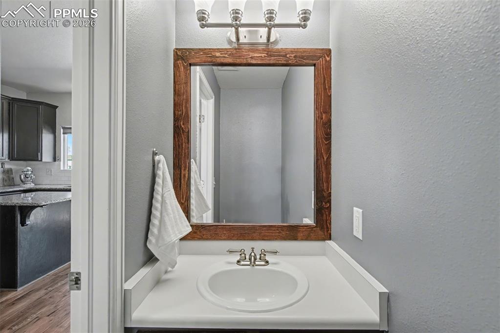 Image 12 of 24: Half bath on main level