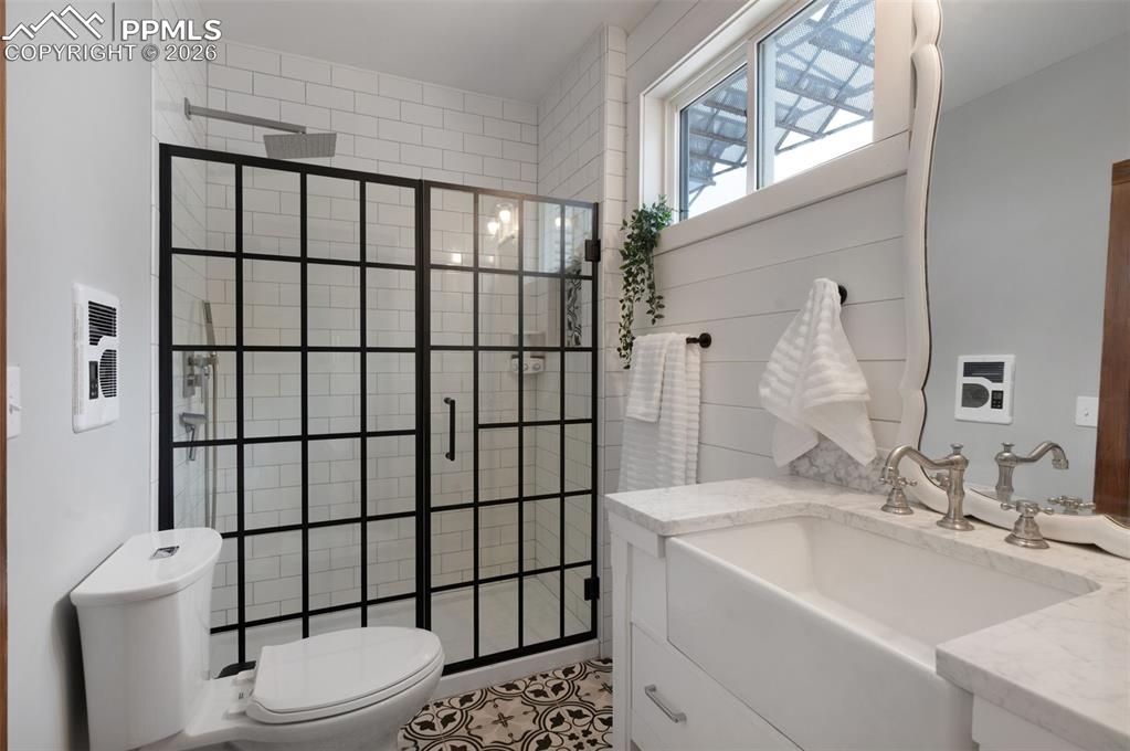 Image 10 of 28: Bathroom on main floor