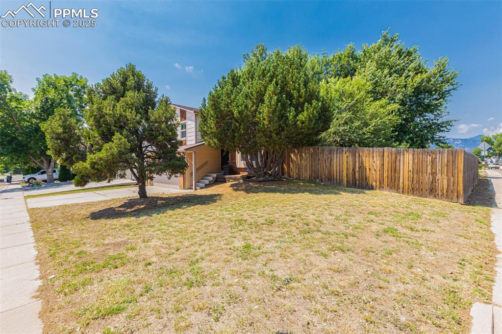 Image 39 of 43: View of yard with driveway