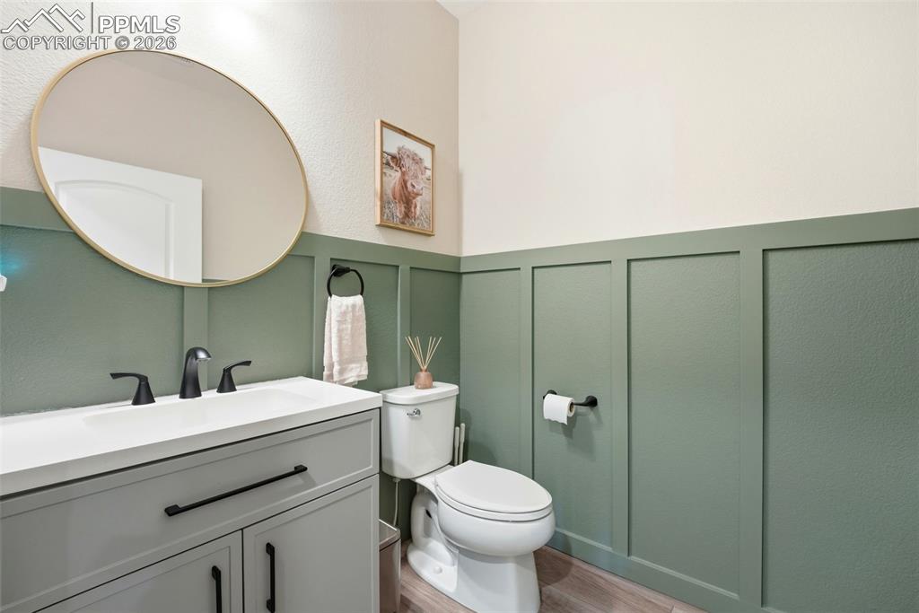 Image 15 of 42: Main Floor Powder Bath