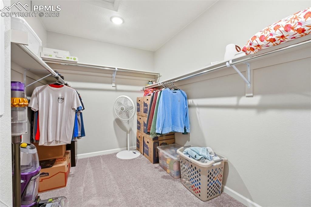 Image 21 of 42: Primary Closet