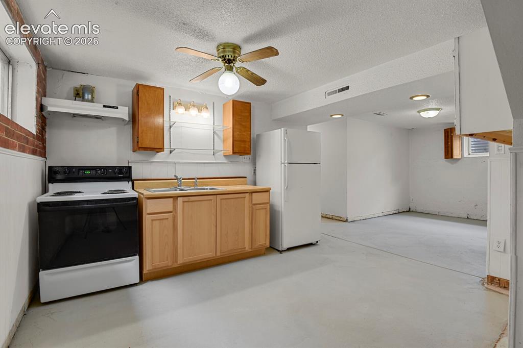 Image 26 of 46: Basement Kitchen