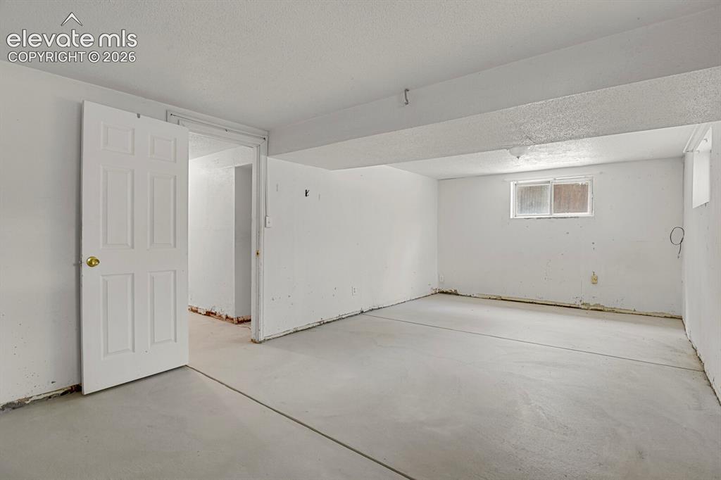 Image 29 of 46: Basement Bedroom