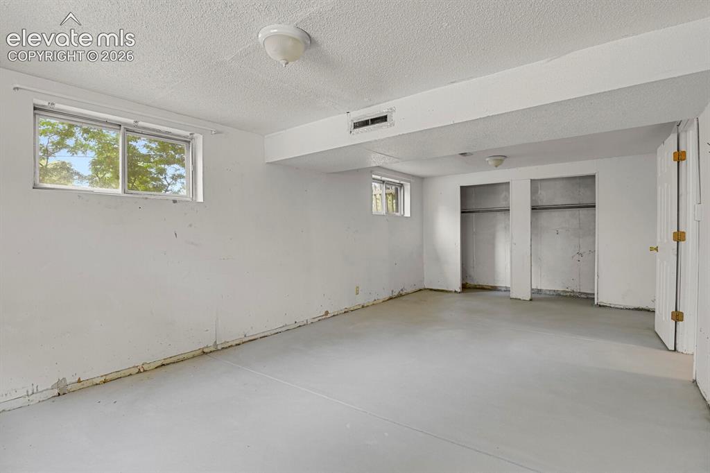 Image 30 of 46: Basement Bedroom