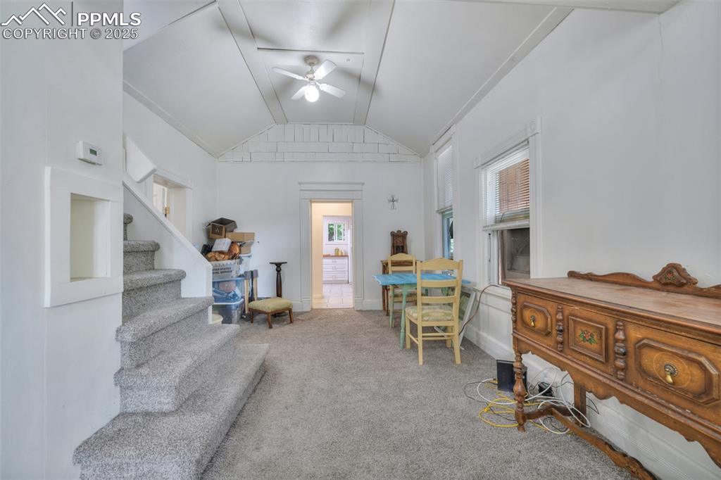 Image 10 of 38: The stairs on the left go to the original hayloft, now offering unlimited u