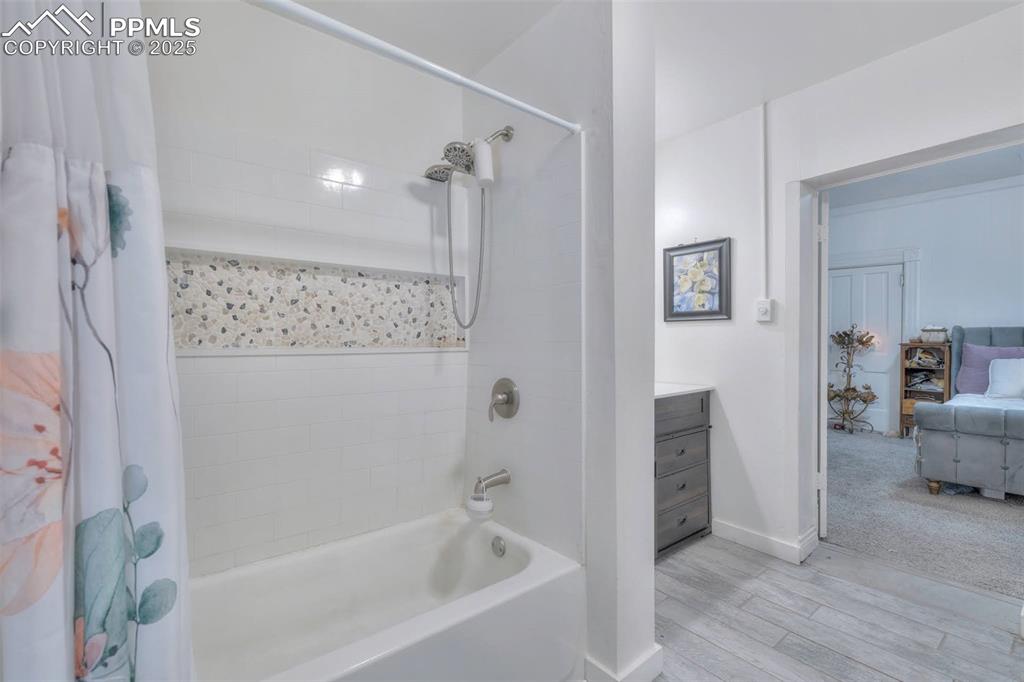 Image 22 of 38: The 2nd bedroom also opens to the laundry, conveniently located in the bedr