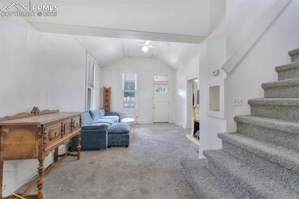 Image 5 of 38: From the dining area, showing the living room, entry, door to the master be