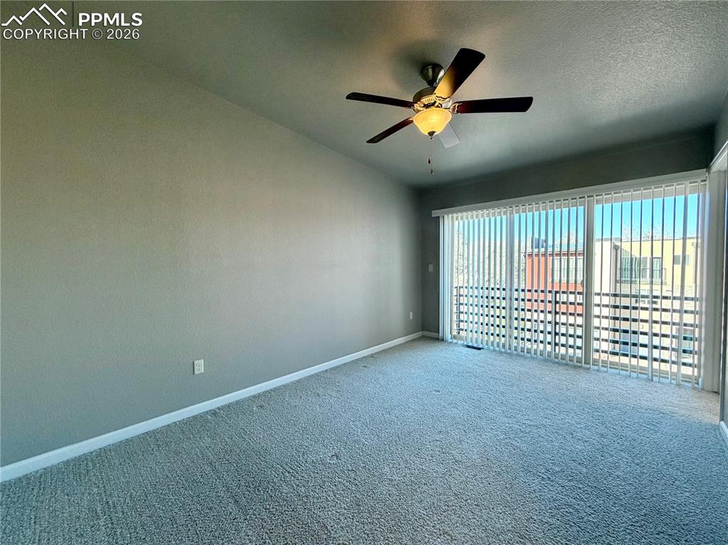 Image 26 of 42: Large Primary Bedroom with Juliet Balcony.