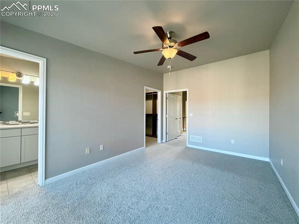 Image 28 of 42: Primary Bedroom with en-suite and Walk-in Closet