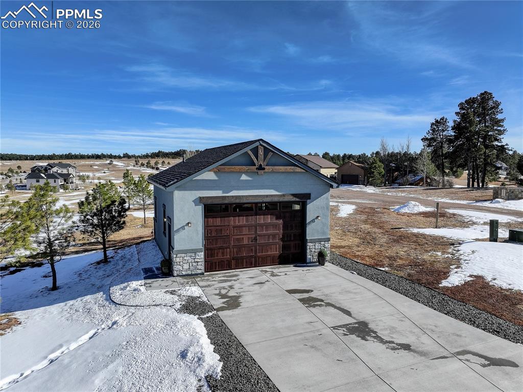 Image 38 of 49: Additional detached 4-car garage / workshop