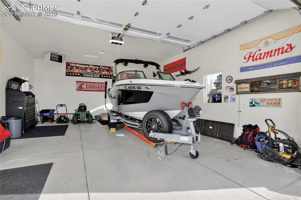 Image 39 of 49: Heated 4-car detached garage / workshop