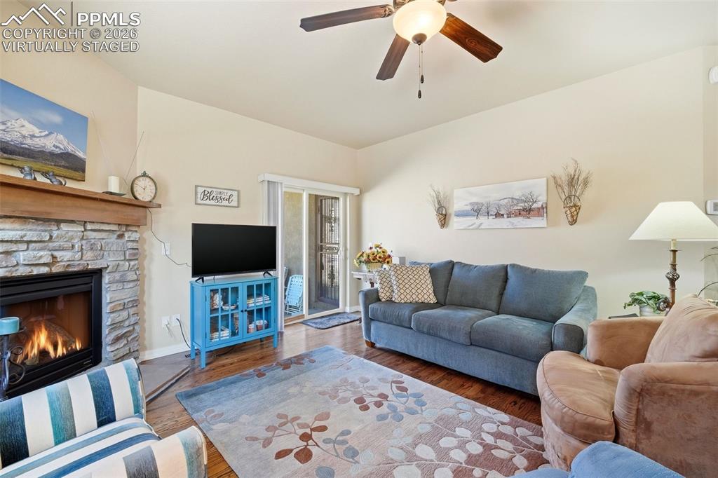 Image 4 of 50: VIRTUALLY STAGED - FLAMES IN FIREPLACE