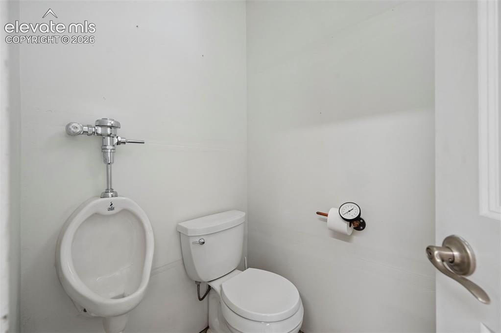 Image 25 of 50: Bathroom in the garage