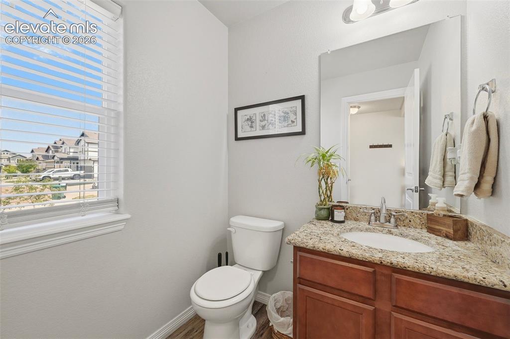 Image 13 of 42: Half bathroom on main floor
