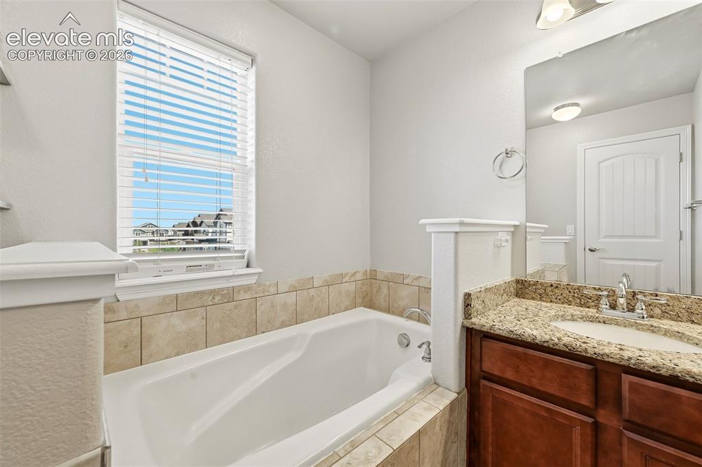 Image 32 of 42: 5 piece primary bathroom