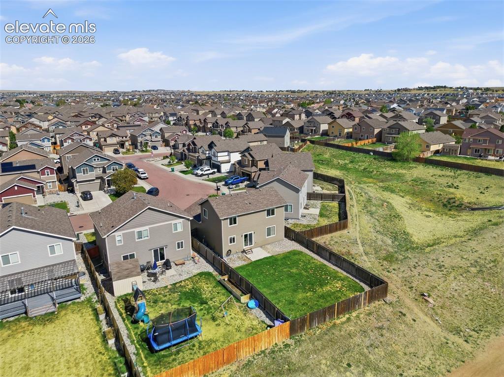 Image 7 of 42: Open space behind this lot means minimal neighnors!