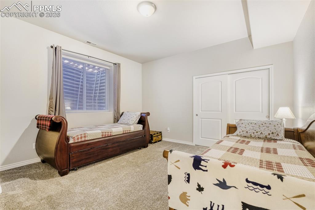 Image 32 of 47: 4th basement bedroom with brand new carpet