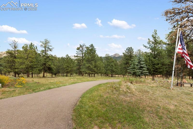 Image 9 of 37: Surrounding community featuring a mountain view, a view of countryside, and