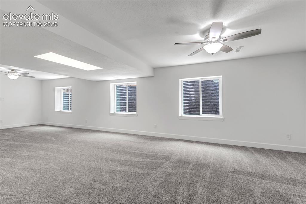 Image 19 of 50: BRAND NEW, FINISHED BASEMENT!