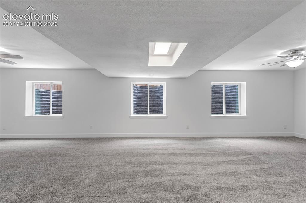 Image 20 of 50: BRAND NEW, FINISHED BASEMENT!