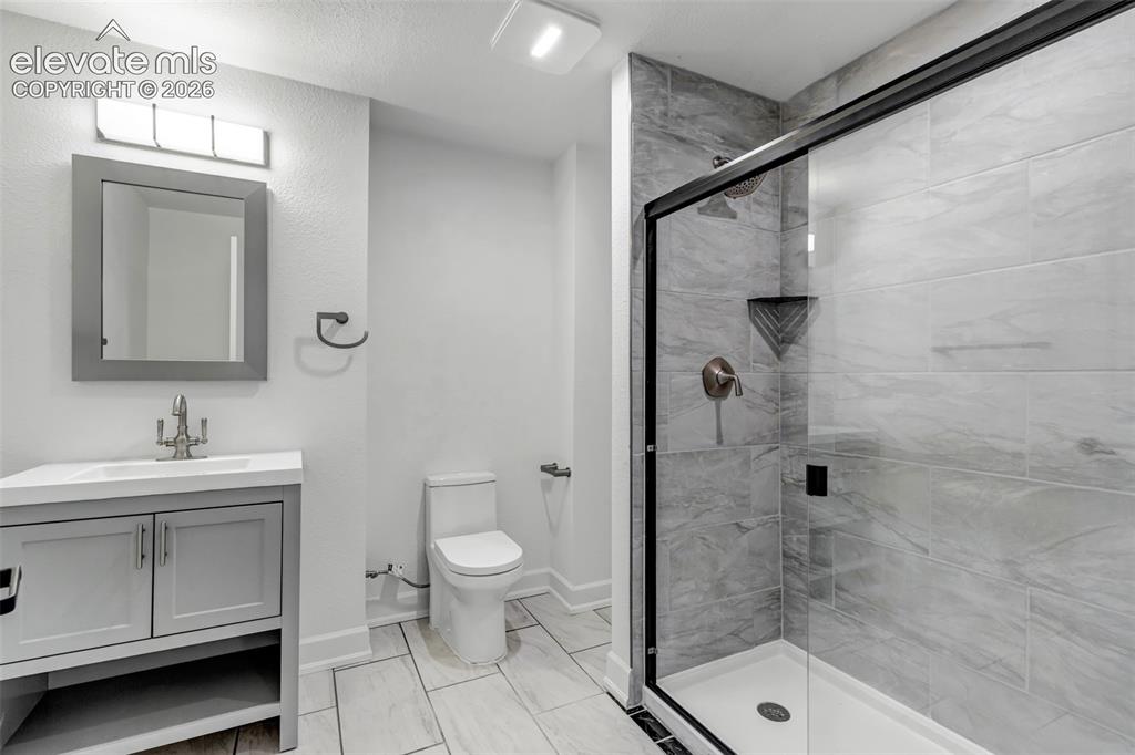 Image 25 of 50: BRAND NEW, FINISHED BASEMENT, BATHROOM.