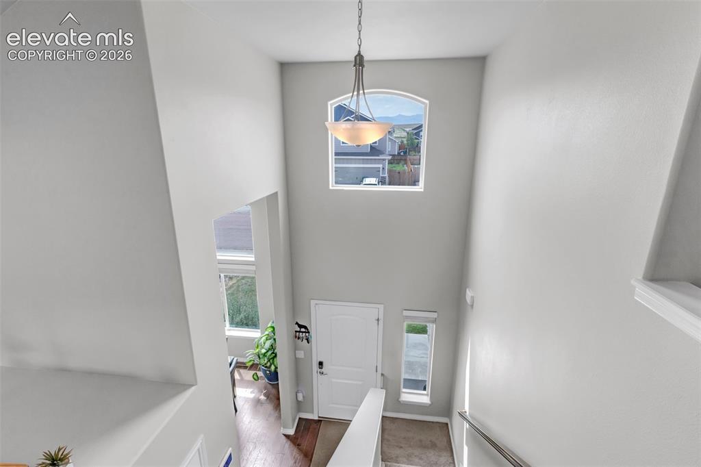 Image 6 of 50: UPPER LOFT VIEW OF ENTRY WAY.