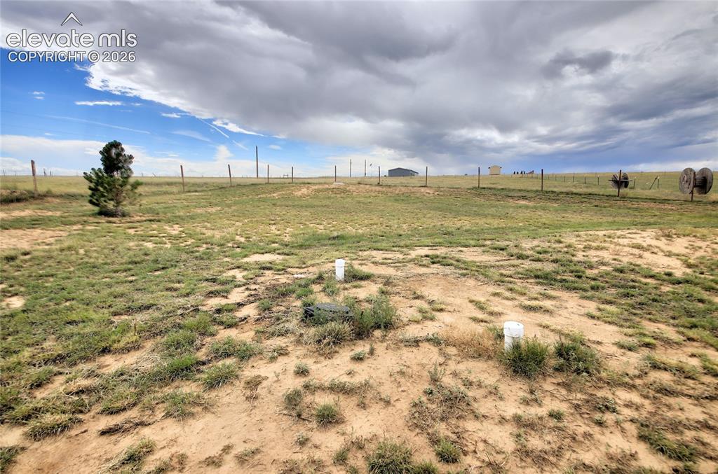 Image 28 of 50: Rear yard showing septic locale