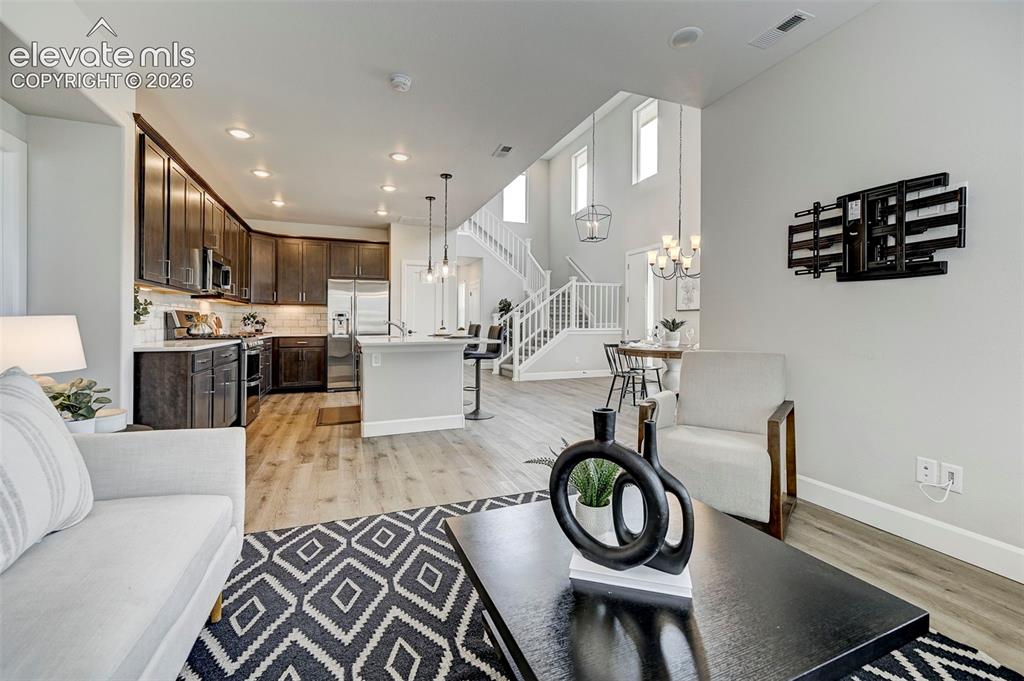 Image 13 of 37: This gorgeous living room is spacious without being overpowering.