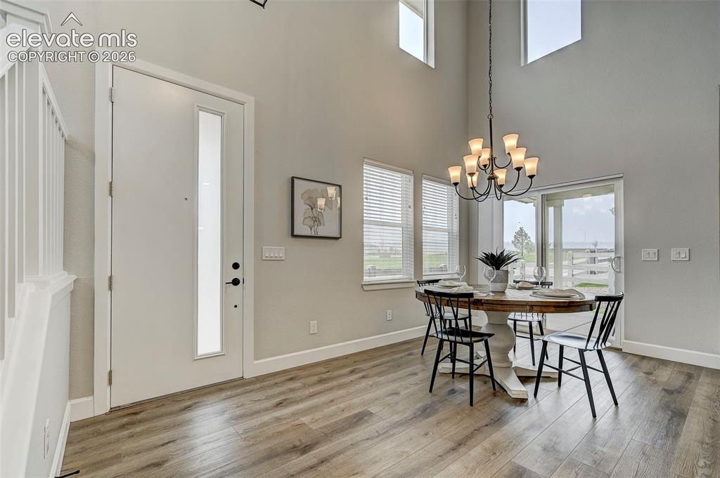 Image 4 of 37: Welcome guests in style with this grand entry that opens to the living room